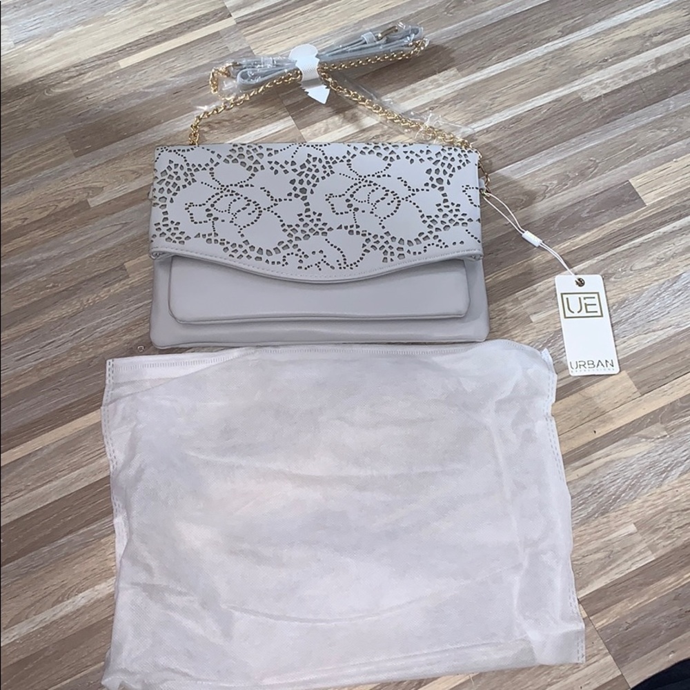 Urban expressions floral laser cut crossbody!